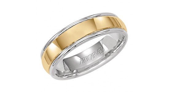 A mixed metal men’s wedding band from ArtCarved, available at Northeastern Fine Jewelry.