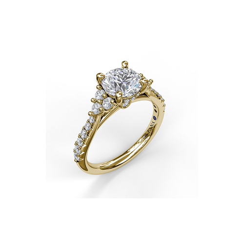 A yellow gold sidestone diamond engagement ring in a half continuity