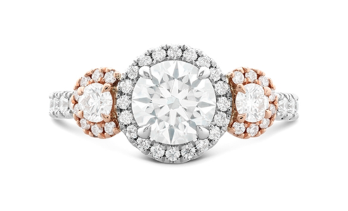 A two-toned three stone engagement ring from Hearts on Fire, available at Northeastern Fine Jewelers.