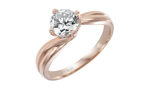 An Artcarved solitaire engagement ring with a graceful and organic band, available at Northeastern Fine Jewelers.