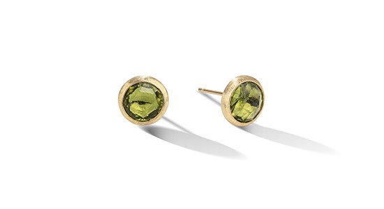 a pair of yellow gold peridot studs by Marco Bicego