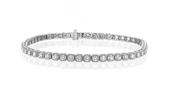 A white gold diamond tennis bracelet by Simon G., available at Northeastern Fine Jewelry.