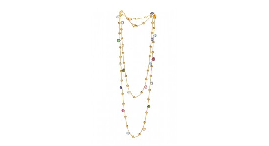 a yellow gold necklace by Marco Bicego with a long chain and various gemstones