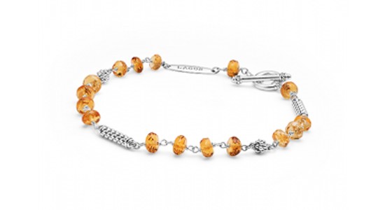 a white gold beaded bracelet featuring citrine beads by Lagos