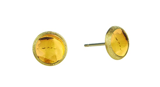 a pair of round, yellow gold stud earrings featuring citrine