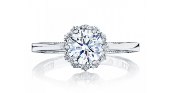 a white gold engagement ring with a unique halo