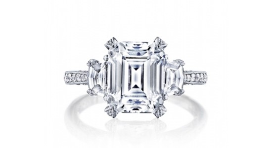 an art deco-inspired engagement ring with an emerald cut center stone