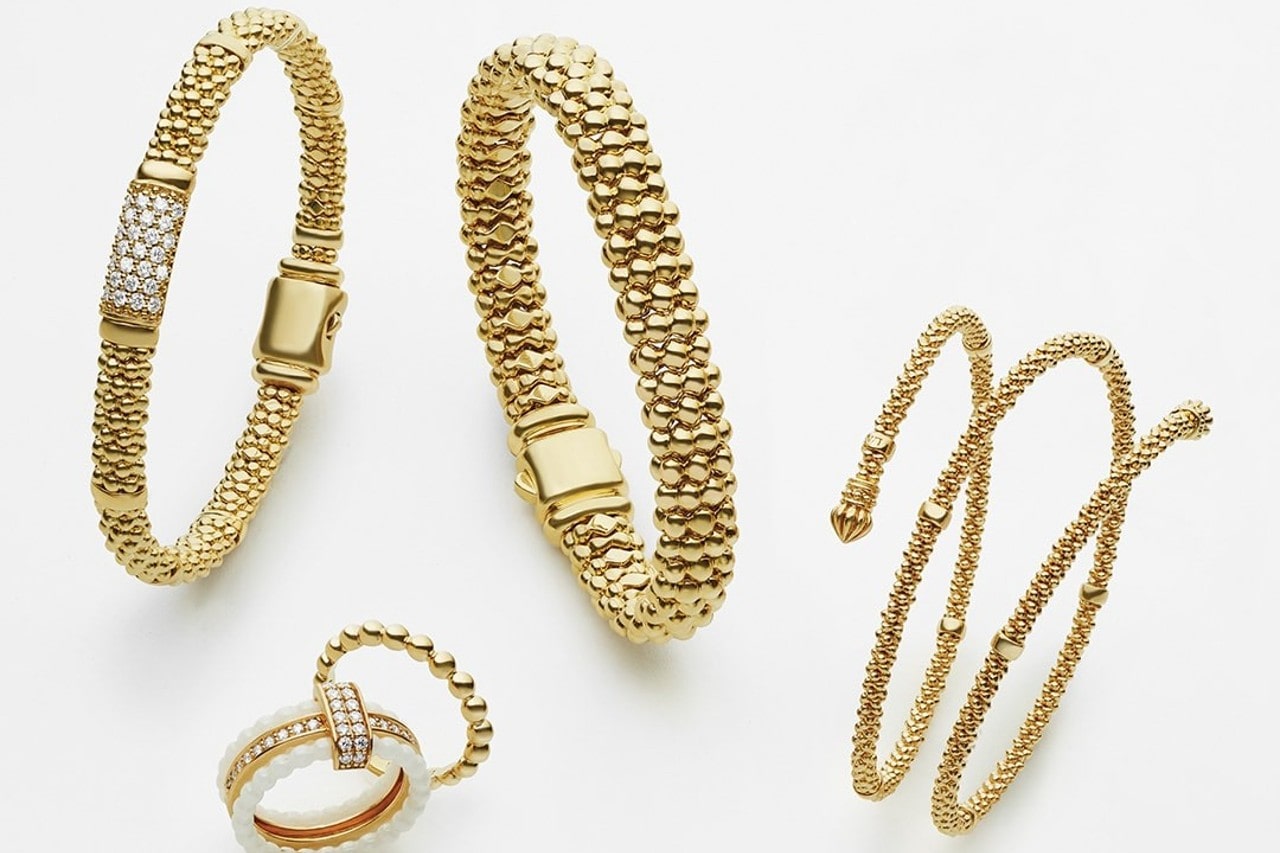 three gold Lagos bracelets and two Lagos fashion rings